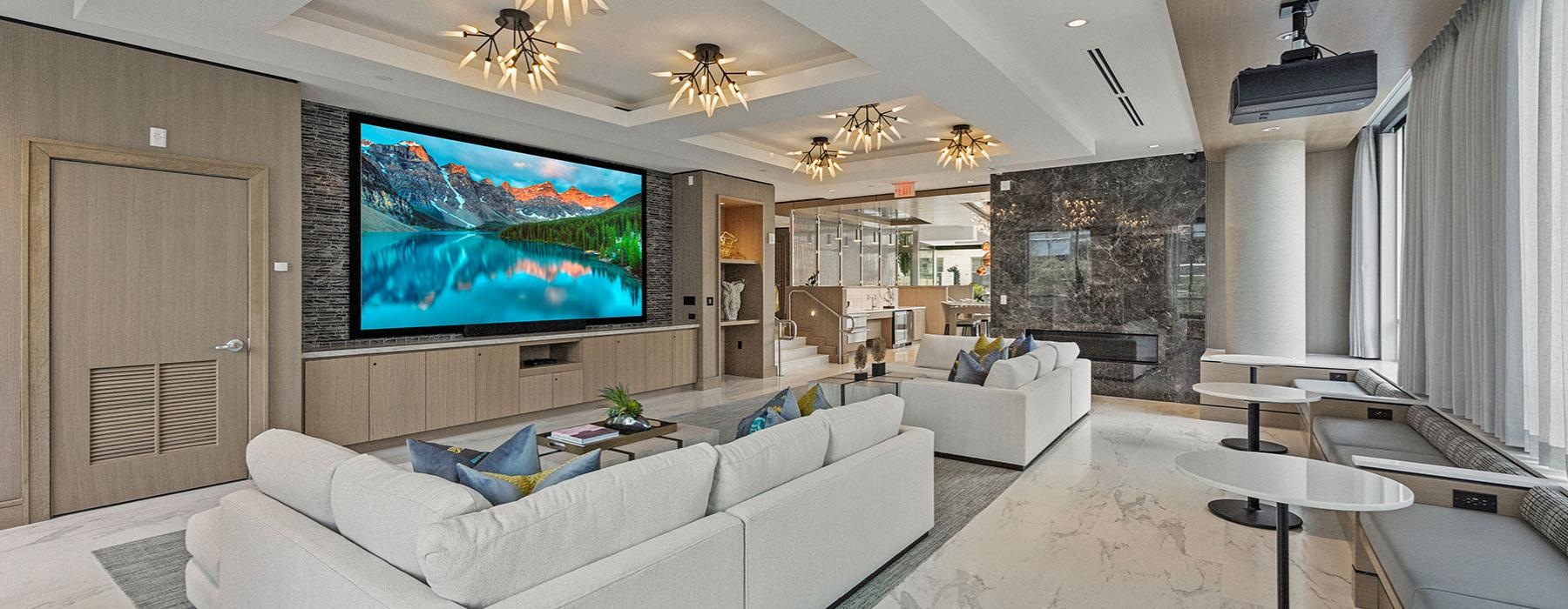 a living room with a large screen